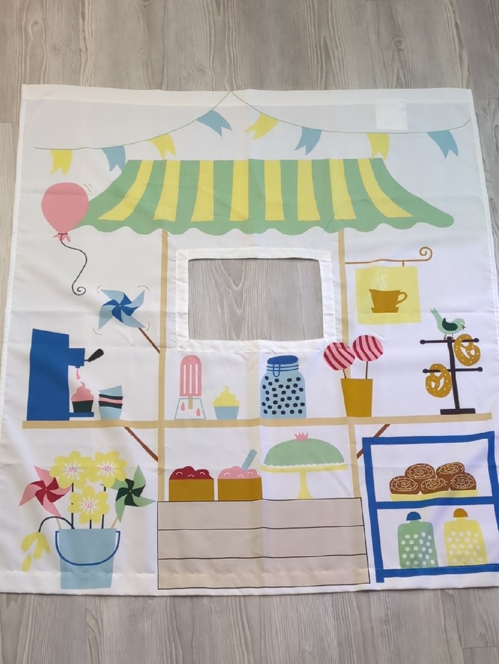 IKEA KURA Kids Bed Curtain featuring a market stall pattern